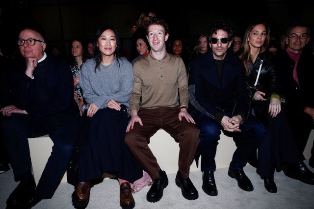 Mark Zuckerberg looking like a clown front row at Prada.