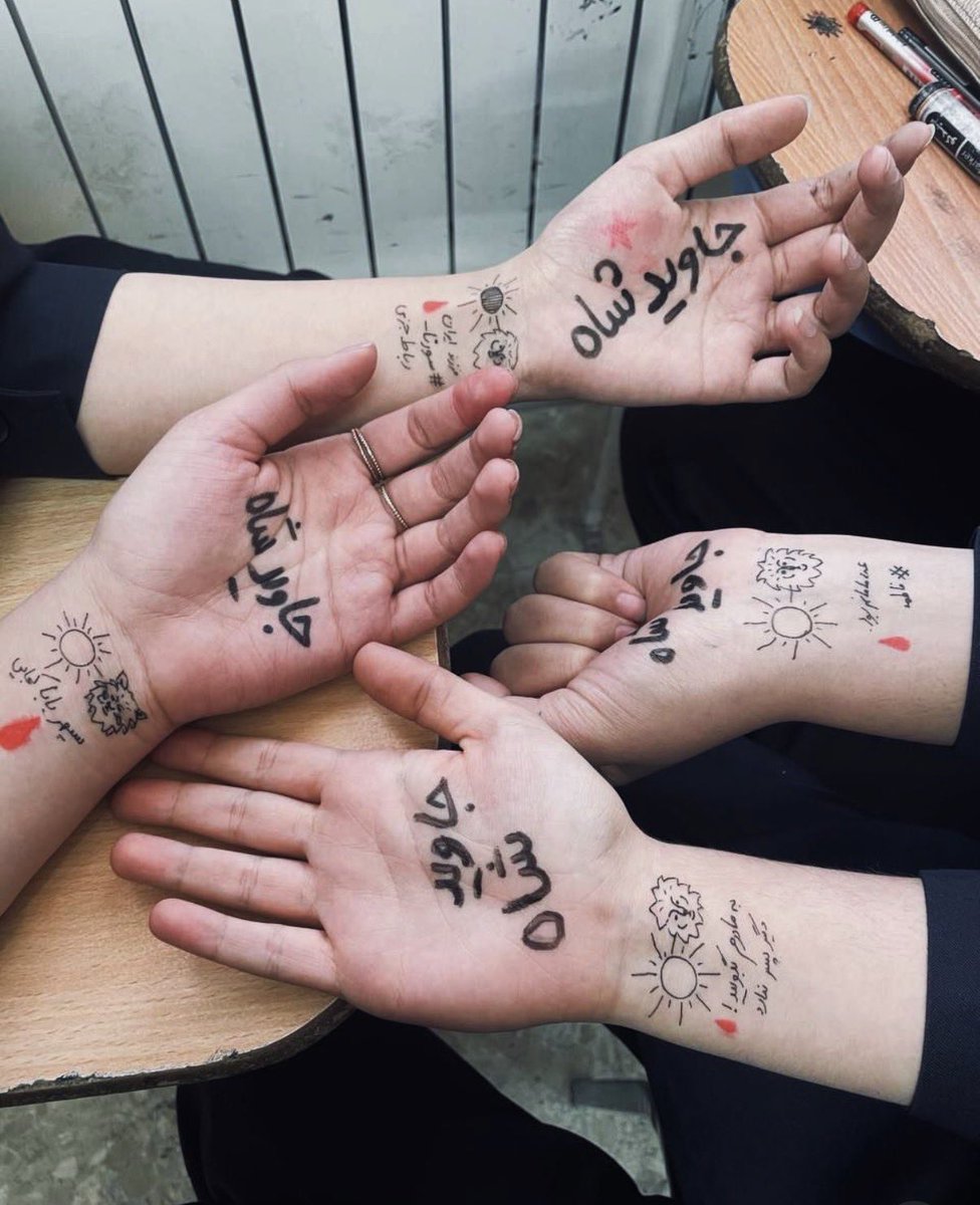 Savakzadeh's tweet photo. Beautiful image displaying the unity and courage of the students in Iran, who keep risking everything. 

“Javid Shah” (Long live the Shah) written on their hands!

Be their voice. Keep talking about Iran. https://t.co/u9R87ssBlP