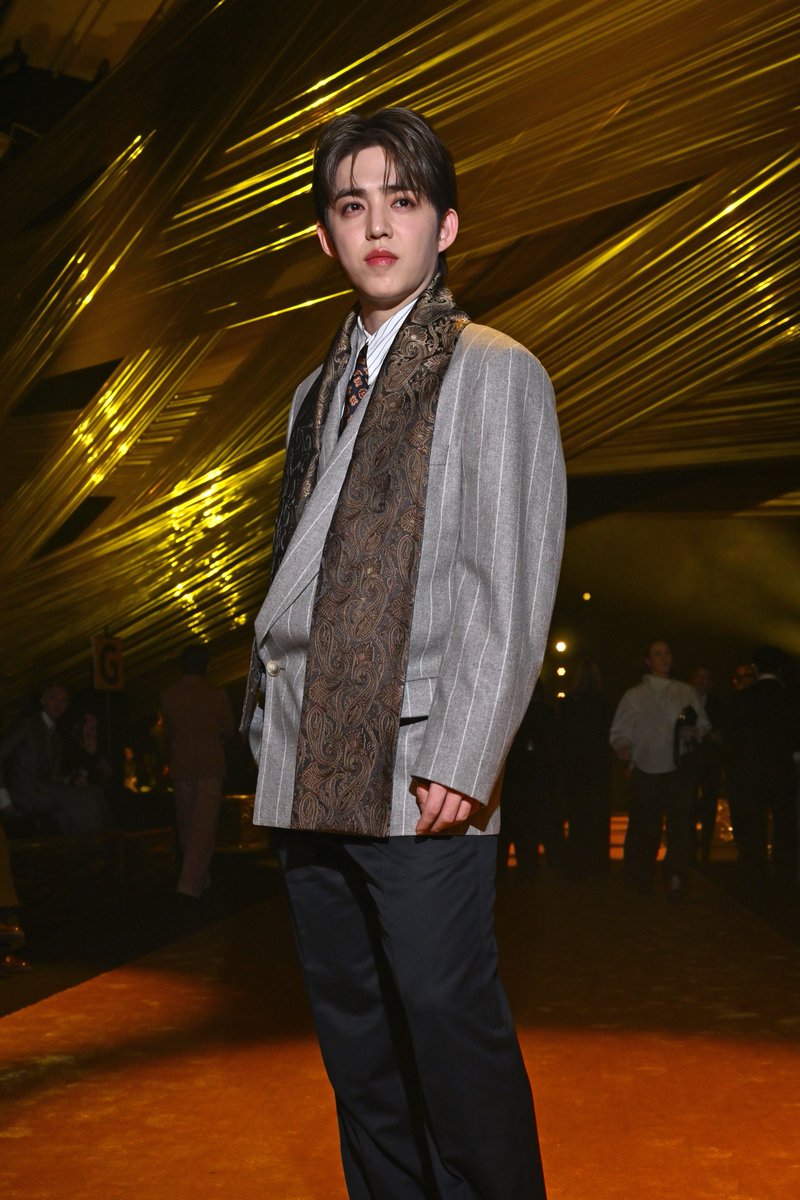 Global Brand Ambassador #SCOUPS stuns at the Boss FW26 show during Milan Fashion Week.