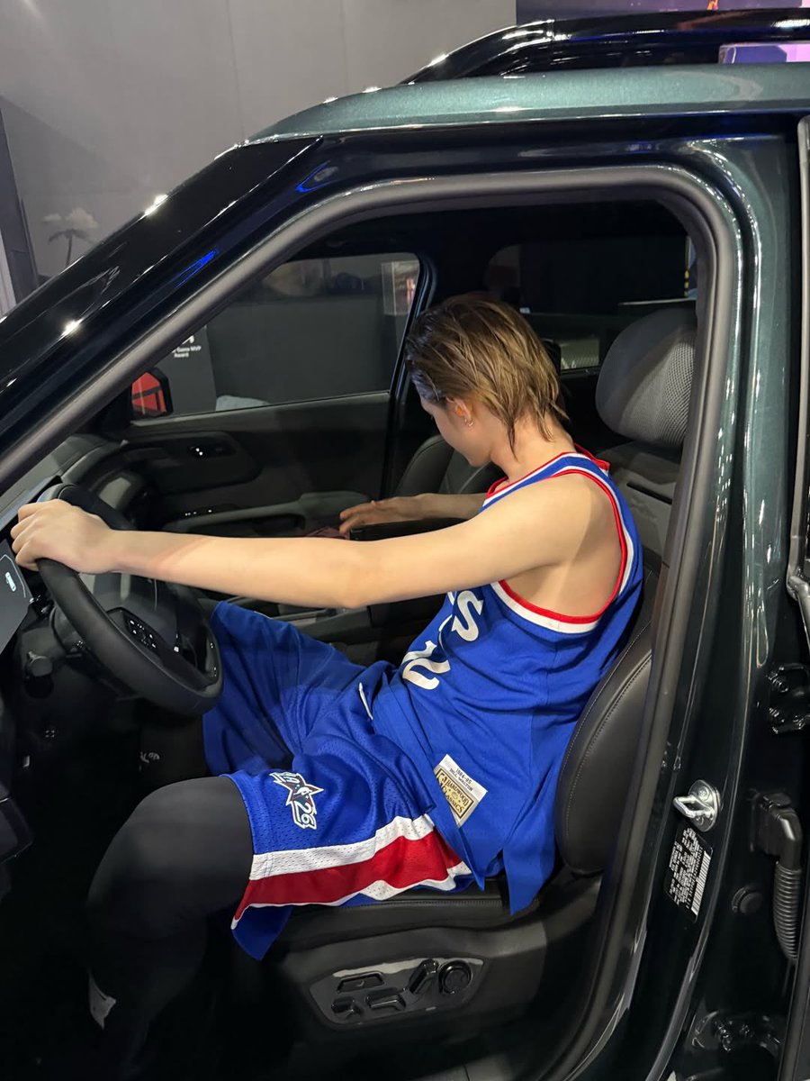 Sitting behind the wheel like the night belongs to me, jersey still on and energy still high. The lights outside reflect softly on the glass while I take a quiet second to breathe. Sometimes the pause after the rush feels just as powerful as the game itself.