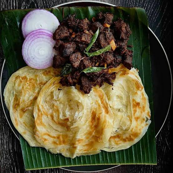 mayur17nov's tweet photo. @preety_illusion My plate of kerala parotta &amp; beef free from hatred,  it unites religions .... It brings India together .... Peace 🙏 https://t.co/JHQi5AJZxW