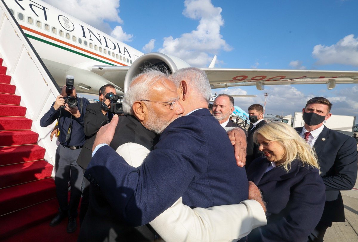 BJP4India's tweet photo. Israeli Prime Minister Netanyahu and his wife extended a warm farewell to PM Modi at Tel Aviv airport as he departed for India, marking the conclusion of a successful and productive two-day visit to Israel. 

Heartwarming visuals from the airport ⬇️ https://t.co/URurfQtg8p