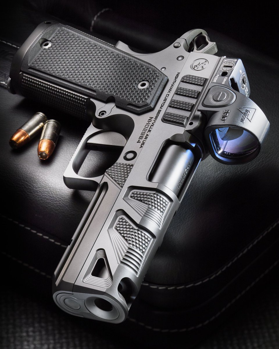 NighthawkCustom's tweet photo. Our new chunk-ported Alpha Hawk in black DLC with black G10 grips and serration inserts // Long live the single stack 🤘 https://t.co/iXoo0cIRV9
