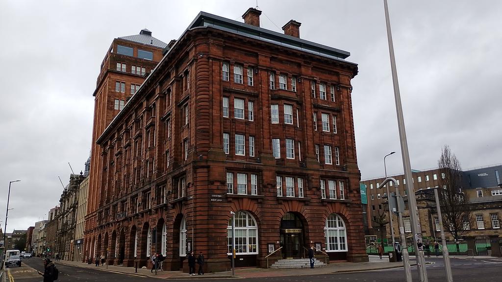 JamesMunro5's tweet image. D C Thomson HQ and one of the company's employees in #Dundee city centre.