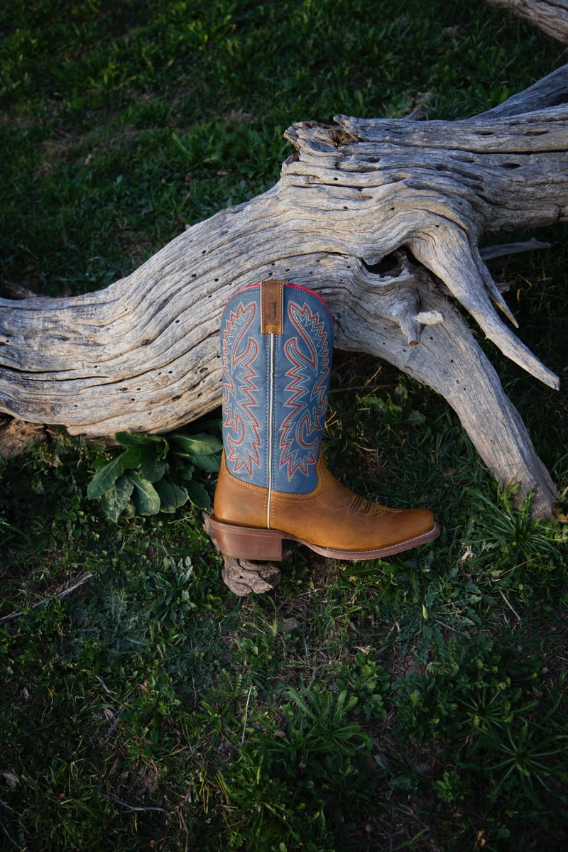 Bold enough to stand out, versatile enough for everyday wear 🤠💫 | Men's Show Off 13in Square Toe Cowboy Boots in Blue/Brown by @justinboots_