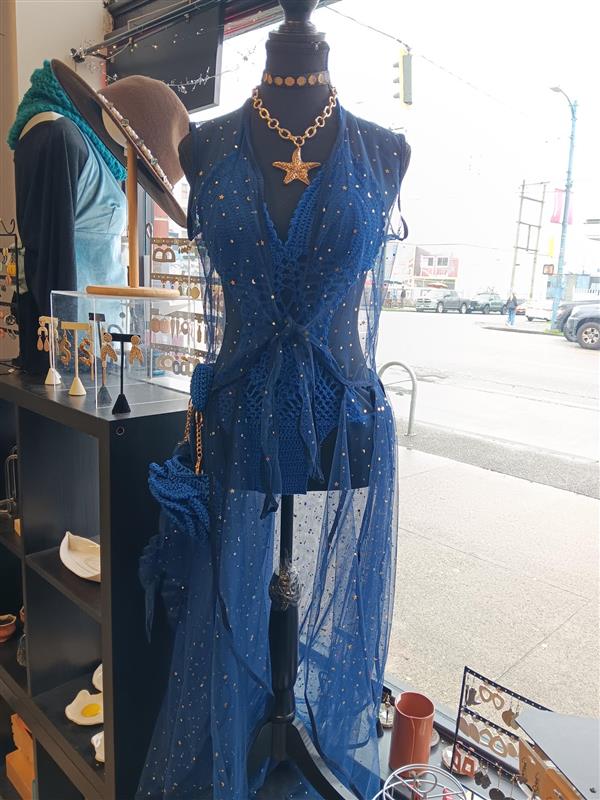 EWMASTORE's tweet photo. Available in-store now! 🛍️ Check out these stunning VFW SS26 runway designs @EWMASTORE. Crochet bathing suits (blue, silver, gold) $75 each, blue cover-up $75, gold 2-piece cover-up $75, blue crossbody dress $75.

#SupportLocal #ShopSmallBusiness #ArtistSupportingArtist https://t.co/Qqb0cXaHSh
