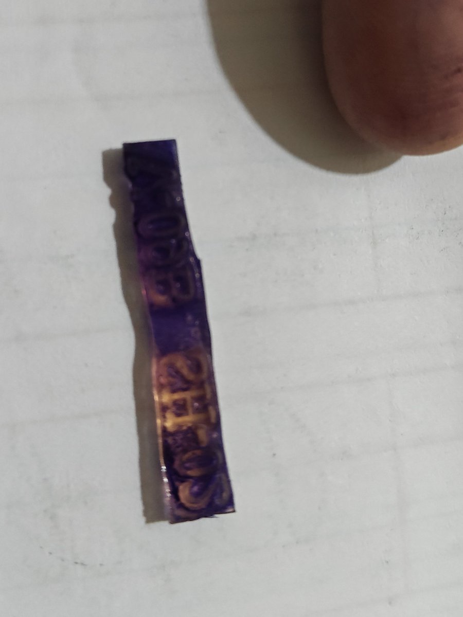 pcrgc's tweet photo. @GokulMilk @fssaiindia  Found this rubber stamp piece in the Gokul milk bag . Had to discard the contents of all the 5 bags bought as it was contaminated by stamp ink. Don't know if the whole batch was also contaminated. https://t.co/YSaYNSkmOc