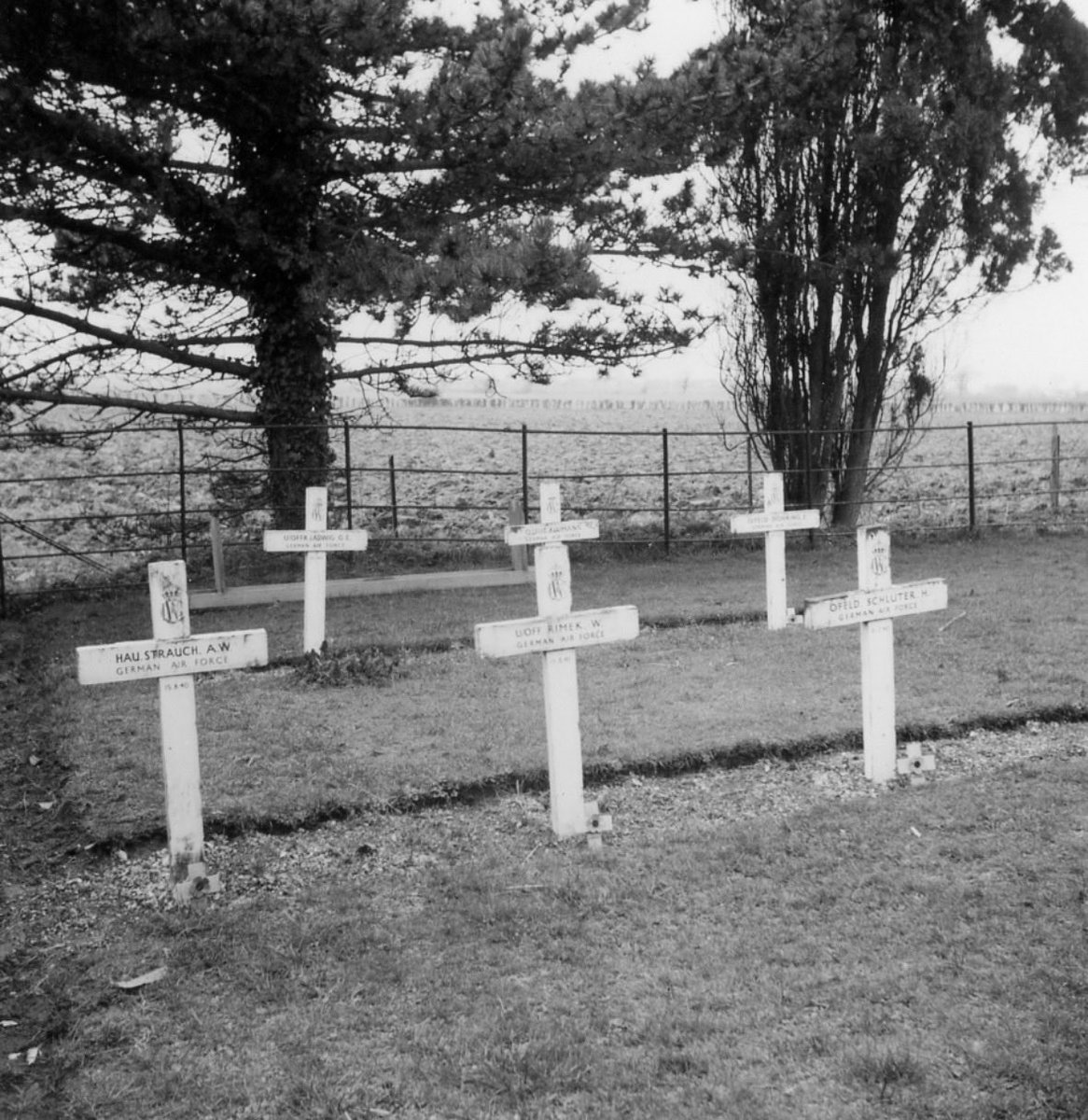 1940Andy's tweet image. Coming across so many interesting things I’d forgotten I had got tucked away as I pull out photos for the Battle of Britain Then &amp;amp; Now update. Here is Tangmere churchyard with the German graves and the IWGC grave markers. The graves are still there but now marked with VDK stone