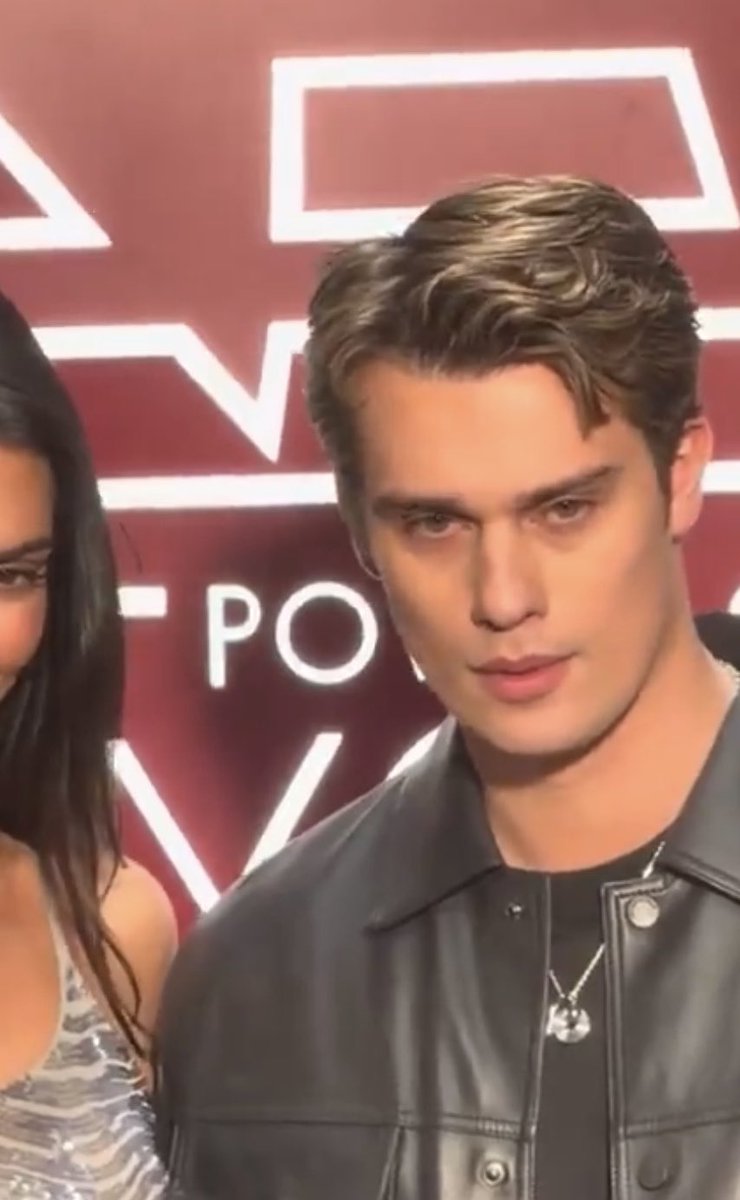 The face of a man ready to leave a party (he has not gone inside the party yet)