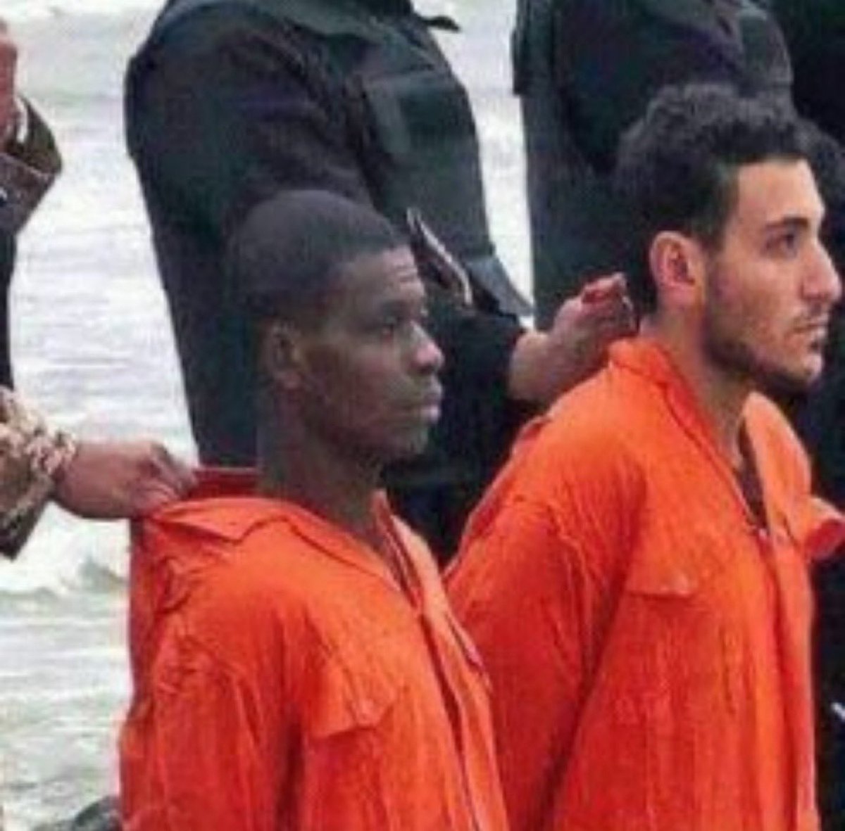 AlBuffalo2nite's tweet photo. Among the 21 men murdered by ISIS on a Libyan shore was Matthew Ayariga of Ghana.

He was not born into the same confession as the others. He was not raised in their Church. He did not share their history.

But in the final moments of his life… standing on cold sand with the sea behind him and death in front of him… he saw something.

He saw men who would not bend.
Men whose lips moved in prayer while blades hovered at their throats.
Men who refused to trade eternity for breath.

Church accounts say that when he was pressed to renounce Christ, he chose instead to stand with them. To join them. To align himself with the very faith that marked them for death.

Imagine that moment.

No time for theology.
No time for debate.
No time for safety.

Only a choice.

Life… or allegiance.

Whether every syllable has been preserved in perfect historical record is not the point. What is undeniable is this:

Twenty-one men knelt in the face of terror.
Twenty-one men were given the chance to deny.
Twenty-one men did not.

Courage is easy when it costs nothing.
Faith is easy when it demands nothing.

But on that beach… faith cost everything.

And none of them walked away.

We will see them again. 

#AStoneGroove