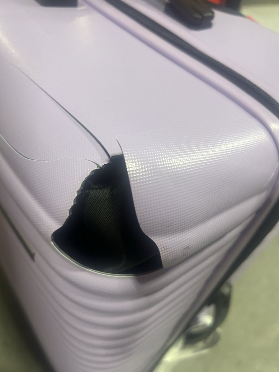 Sarah_Nelse_'s tweet photo. @VirginAtlantic just taken a trip to vegas with you and my case has come off the plane like this. It’s now not usable for the journey home. How can I claim for this please? https://t.co/8R3u5ekj86