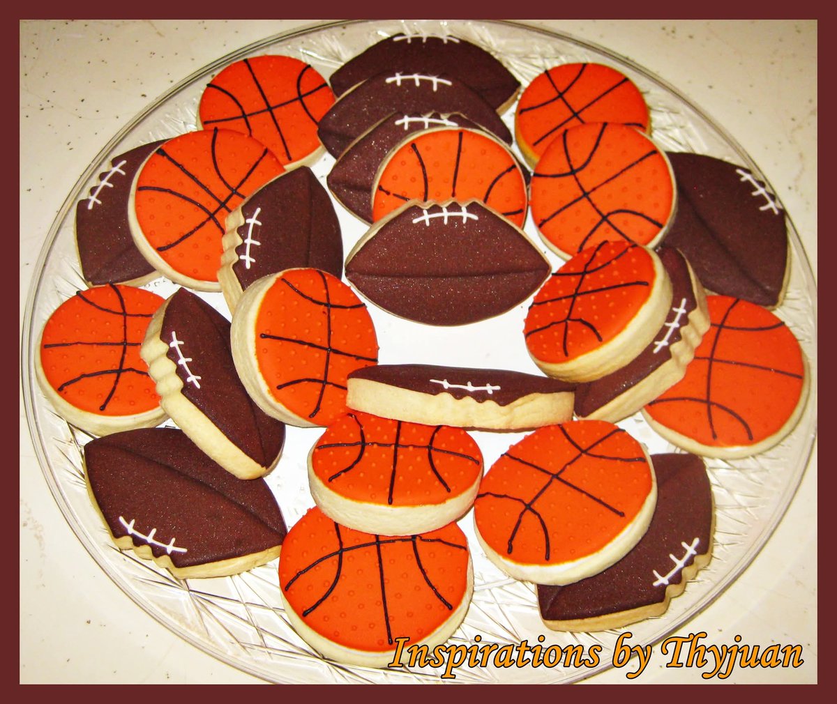 Basketball &amp; Football Cookies 

#basketball  
#football     
#sports   
#basketballcookies     
#footballcookies  
#sportscookies    
#cookies  
#decoratedcookies 
#edibleart 
#cookieart  
#dessert 
#SweetTreats