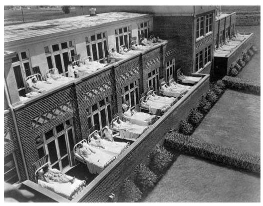 Sunlight was once such a frontline medical treatment that many hospitals had a sundeck or balconies like these where patients could soak up the sun. 

Sunlight was prescribed for tuberculosis, rickets, anthrax, infectious diseases and chronic illness.

Corporate medicine no