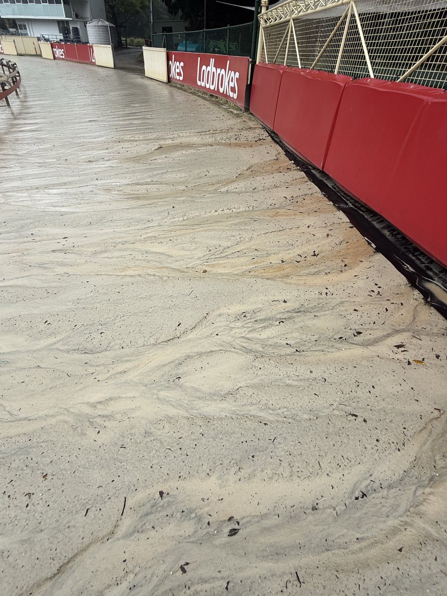 trackboy13's tweet photo. Big team effort today at Wentworth Park after the track got smashed by 140mm of rain overnight which forced the abandonment of Thursdays meeting. Sand shoveled back onto the track, grades reinstated and surface density softened to where it usually sits for race meetings. https://t.co/nrS2fJtOjs