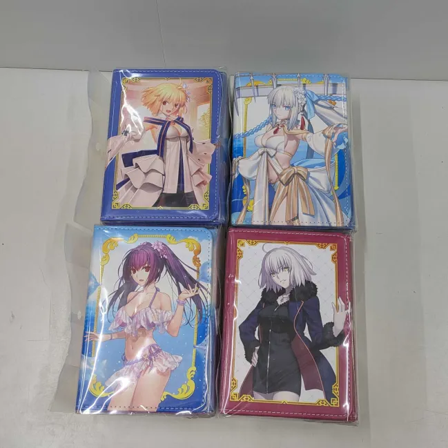 明日発売商品のお知らせ】 ワンピースのスリーブ4種、FGOの各種