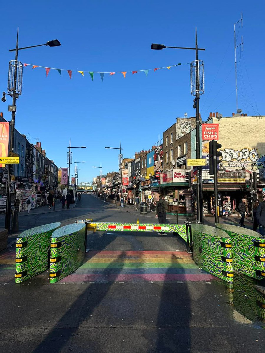 Diversity barriers resting on top of a rainbow crossing. This picture perfectly sums up the UK in 2026.