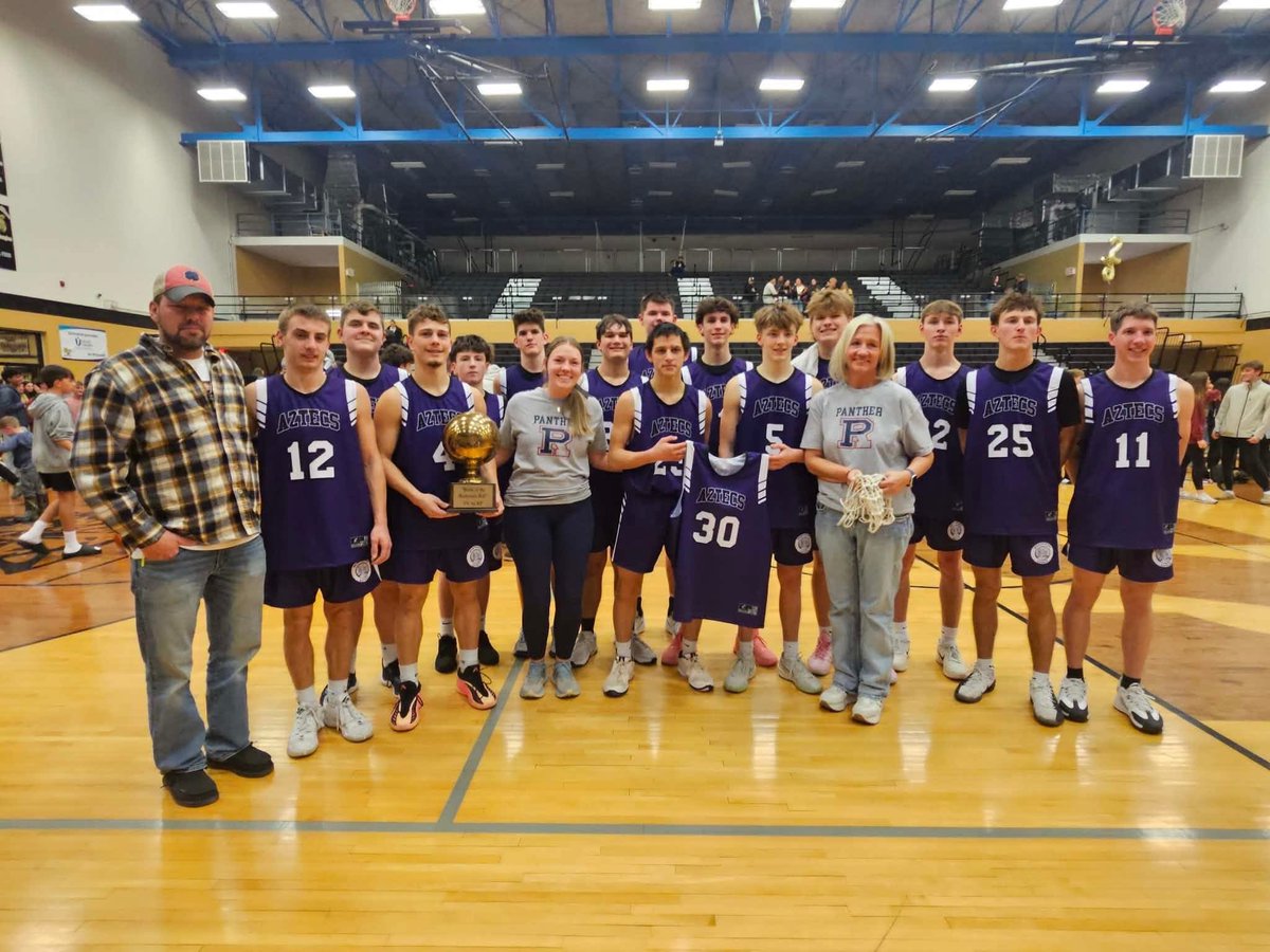 RickSemmler's tweet photo. Thursday night Riverton Parke basketball played their first game since tragic passing of their classmate Chase Bennett. RP beat South Vermillion to win Battle of the Backroads trophy for first time since 2019. After win members of RP gave special net from trophy to Bennett Family https://t.co/brfnp3b8FT