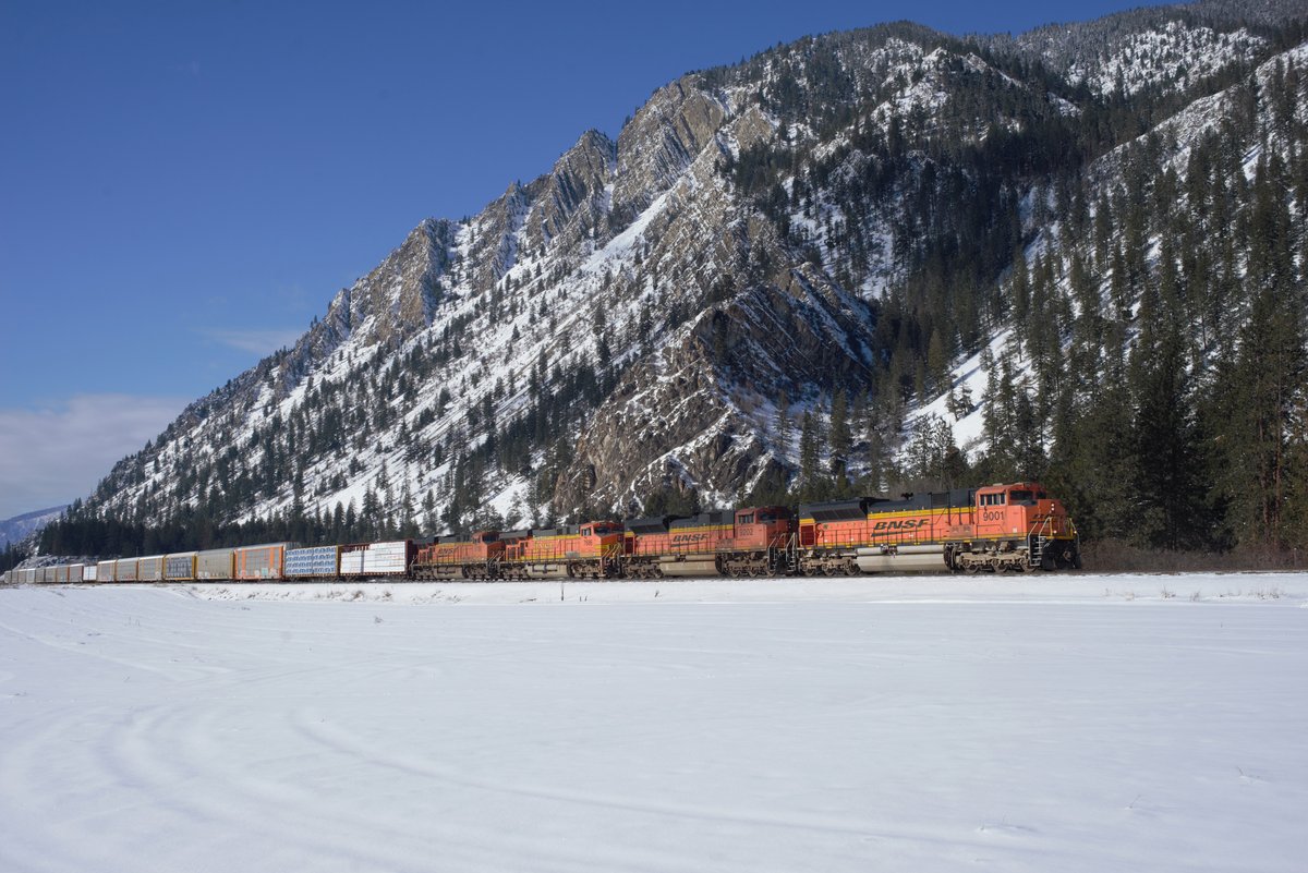 Behold the 2nd place winner in BNSF’s 2026 Winter Photo Contest. Can you tell this is a hay field? We couldn’t either. 🥶 This mixed freight train rolls past Bad Rock Mountain on a cold February day in Montana, west of Missoula. Railfan Rich Wallace did an ice job capturing this