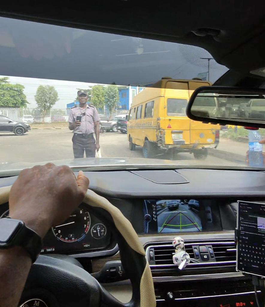 Don't let any policeman, lastma officer or LNSC personnel enter your even if you know you committed a traffic offense. Tell them to send you a ticket for your offense and you will pay through Lagos VIS.

If they're taking pictures of your car allow them do it. It's a scare