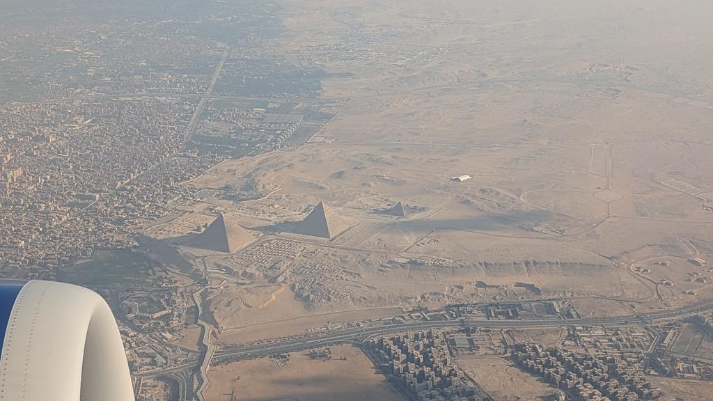 UnchartedX1's tweet image. Leaving nor cal on a foggy and very early morning, 28ish hours and 3 flights later landing with quite a view. After many trips here this is, I think, the first time I've had this spectacular flight path into Cairo! #egypt #pyramids