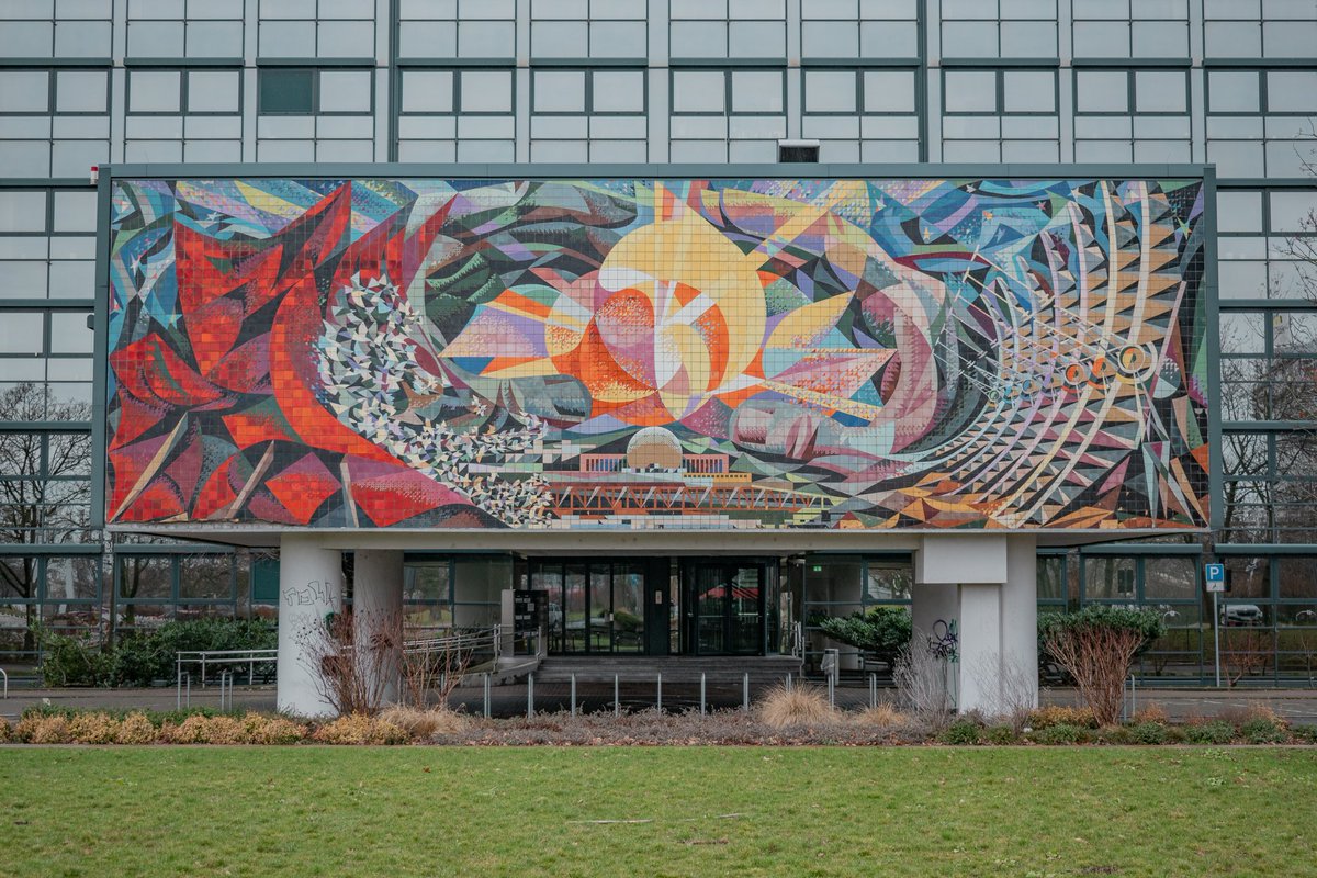 GDRvisuals's tweet photo. GDR era mosaic in Halle titled "The Peaceful Use of Nuclear Energy", designed by Josep Renau in 1971. https://t.co/ZyknK3jkN6