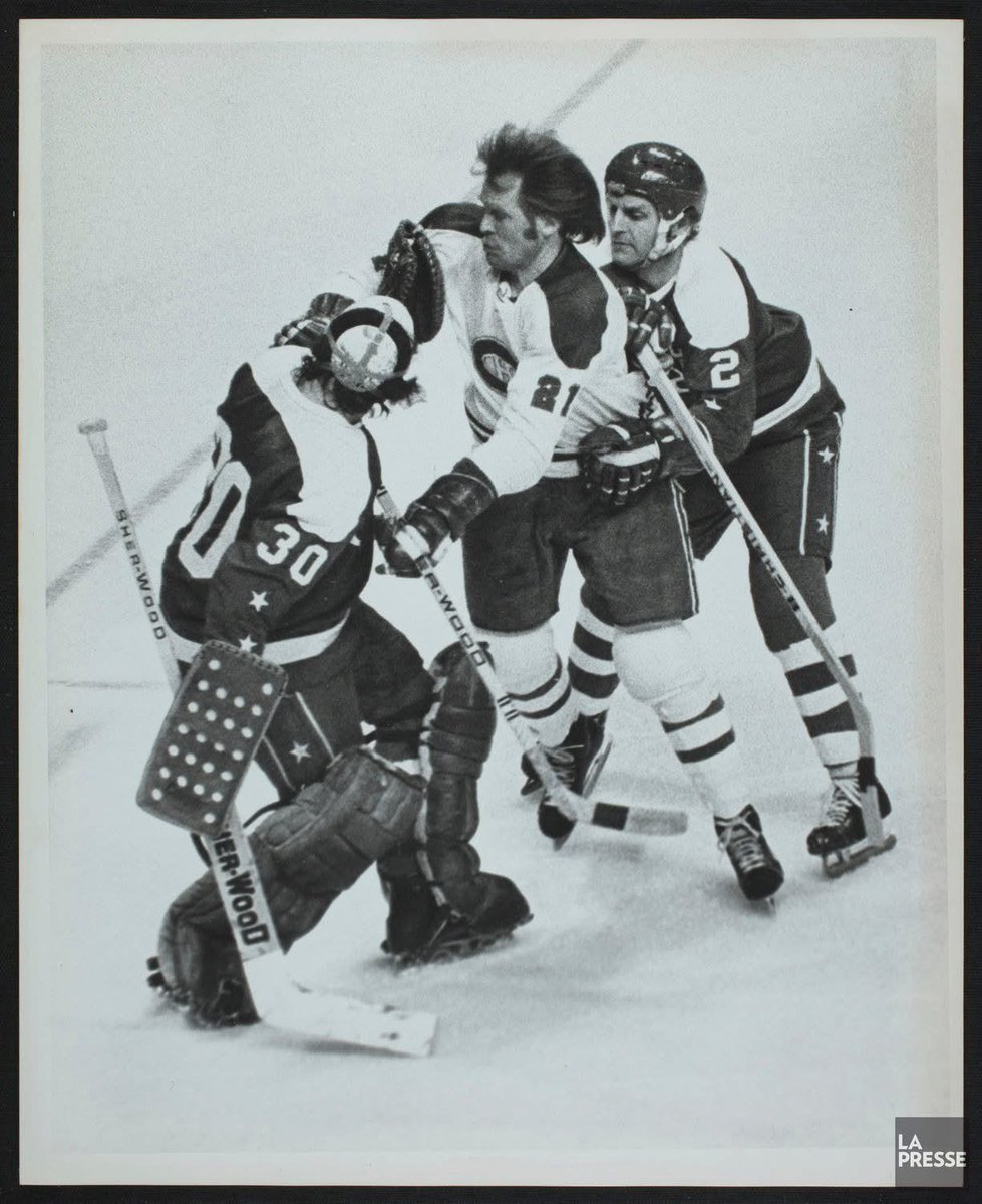 caps_community's tweet photo. Ron Low between the pipes vs Glenn Sather! 💙❤️🤍🏒🥅 #ALLCAPS #NHL #CapsHypeMan #CapsBarTalk #CapsNation #Caps1974 https://t.co/SG17wE2B1y