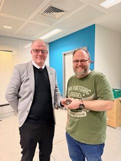 RMTunion's tweet photo. At yesterday’s Kings Cross Branch AGM, RMT President &amp; Branch Secretary for Kings Cross George Welch, presented the 25-year service badge to the Health and Safety representative for Train Mangers. https://t.co/gRlrjRpWwN