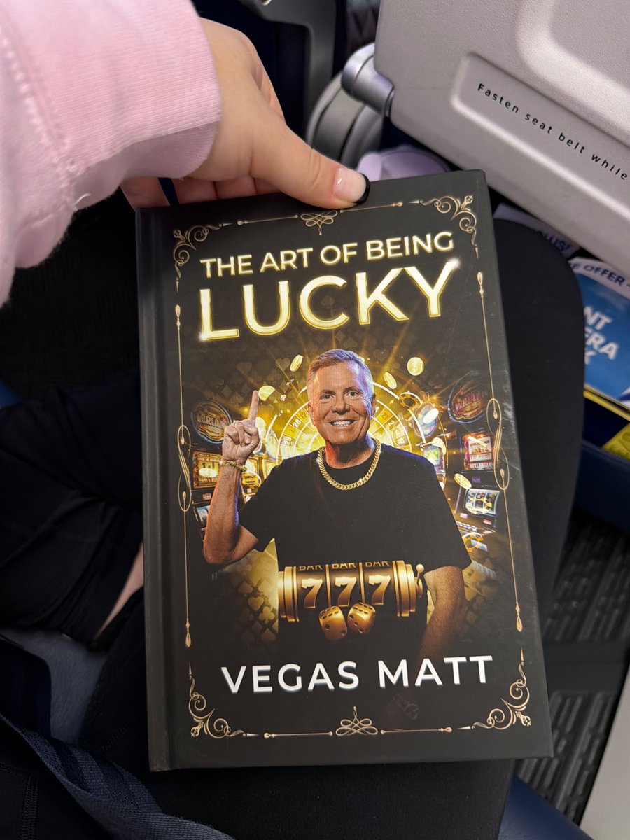 srownbarah's tweet photo. Just some light reading on the plane in case I run into the man, the myth, the legend himself in Vegas this weekend! (Oh and reading it in my pink gamble hoodie ☺️) @itsvegasmatt https://t.co/zqgVZ05Bq1