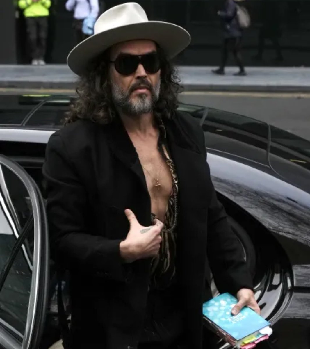 Russell Brand walking into court with a bright blue Bible and that open chest youth pastor cosplay is one of the most pathetic things I’ve ever seen.