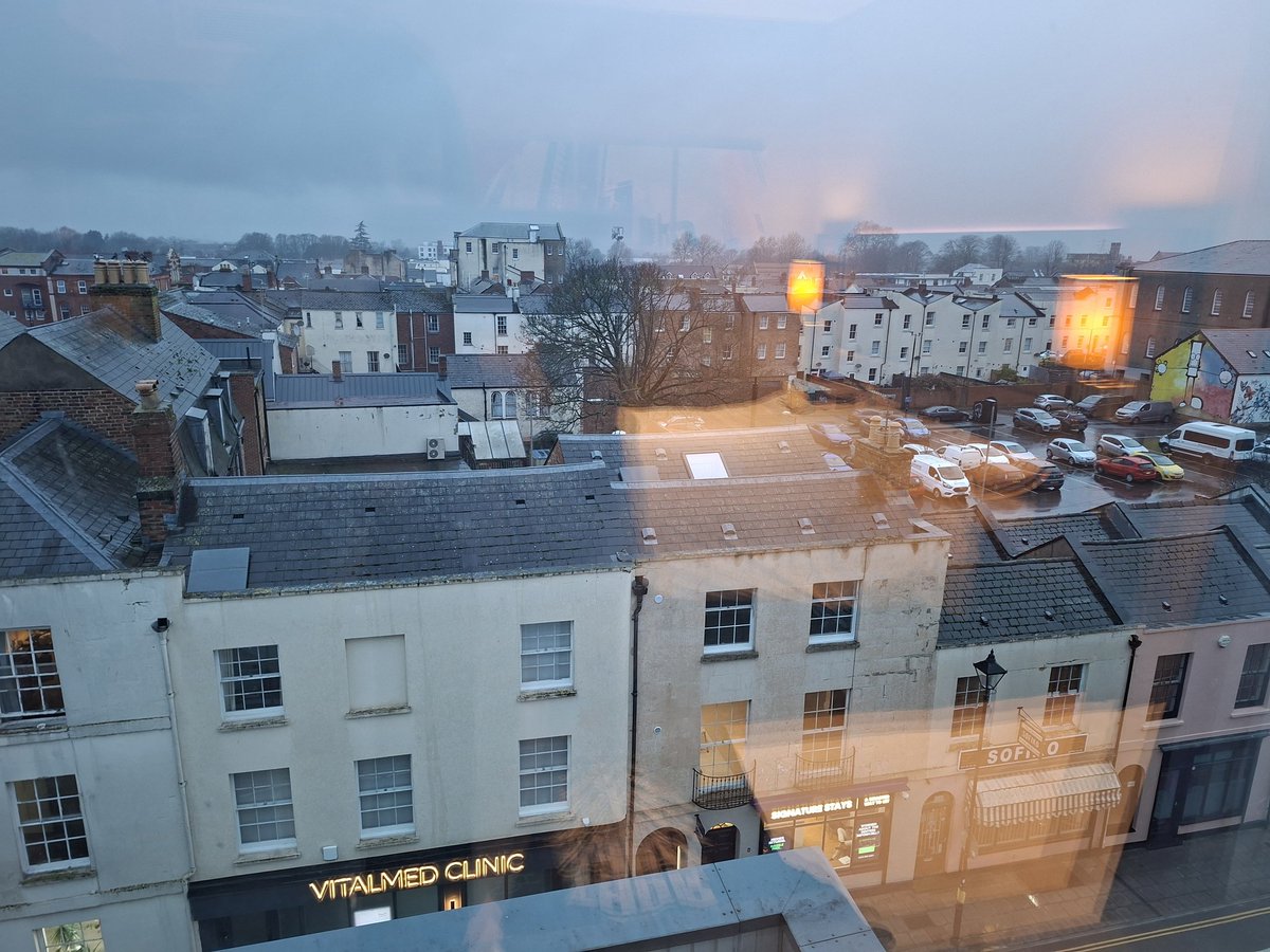 In Cheltenham. It raineth heavily.