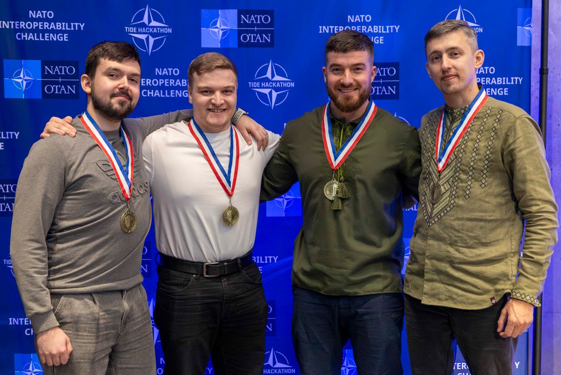 NATO_ACT's tweet photo. Introducing the 2026 #TIDEHackathon Winners!
Ever wonder what happens when top coders, developers and system architects hack under pressure? You get innovative solutions with real operational impact!
Discover what they built: https://t.co/v3NHUnnYBO
#WeAreNATO #Innovation #AI https://t.co/1CP7g2rt3x