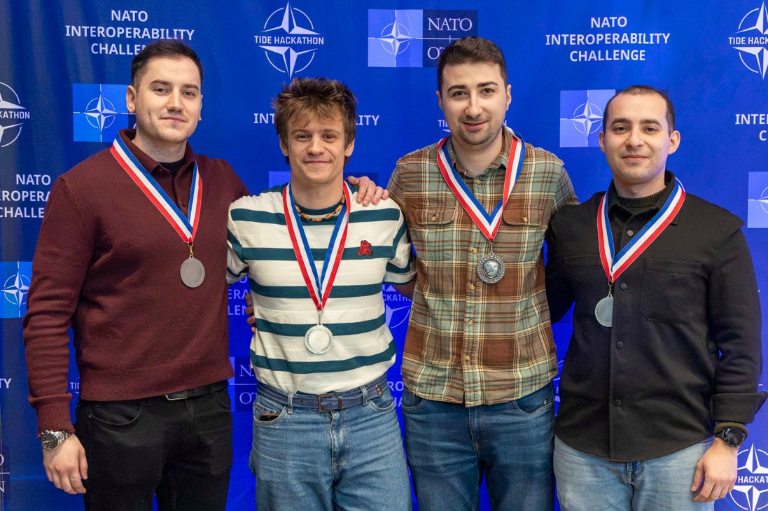 NATO_ACT's tweet photo. Introducing the 2026 #TIDEHackathon Winners!
Ever wonder what happens when top coders, developers and system architects hack under pressure? You get innovative solutions with real operational impact!
Discover what they built: https://t.co/v3NHUnnYBO
#WeAreNATO #Innovation #AI https://t.co/1CP7g2rt3x