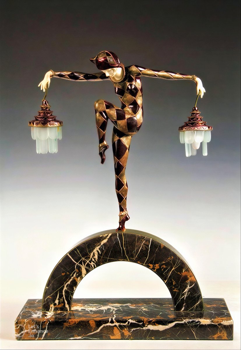"Harlequin" - circa 1925.

Art Deco figural lamp created by French sculptor Marcel-André Bouraine.

Patinated silvered bronze, ivory and frosted glass on a marble base.