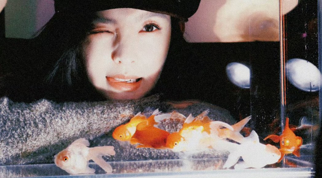 The beret rests softly against my hair, the warm light brushing over my cheek like a memory that refuses to fade. I wasn’t trying to enter anyone’s world back then. I was only chasing mine.