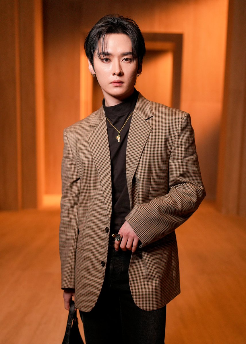 Lee Know attends the Gucci show during Milan Fashion Week Fall 2026