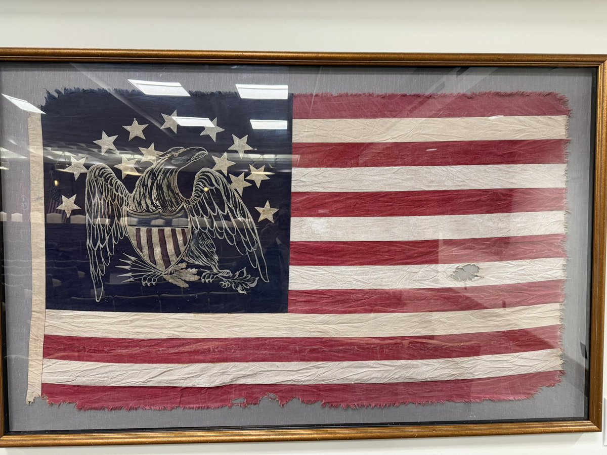 ChrisRodes3's tweet photo. Standing in awe before threads of our nation’s birth.
From the Grand Union Flag (1775–1776) that flew over Washington’s army—still bearing the Union Jack as hope lingered for peace—to the legendary Betsy Ross 13-star circle (1777), symbol of independence and equality.
Then the fierce eagle cantons of the 19th century: hand-embroidered guardians of liberty, carried by militia and patriots through wars and peace.
These tattered, preserved banners remind us: freedom was fought for, not given. Honor the flag. Honor the fight. 🇺🇸🦅 #AmericanHistory #OldGlory #RevolutionaryWar #Patriotism”