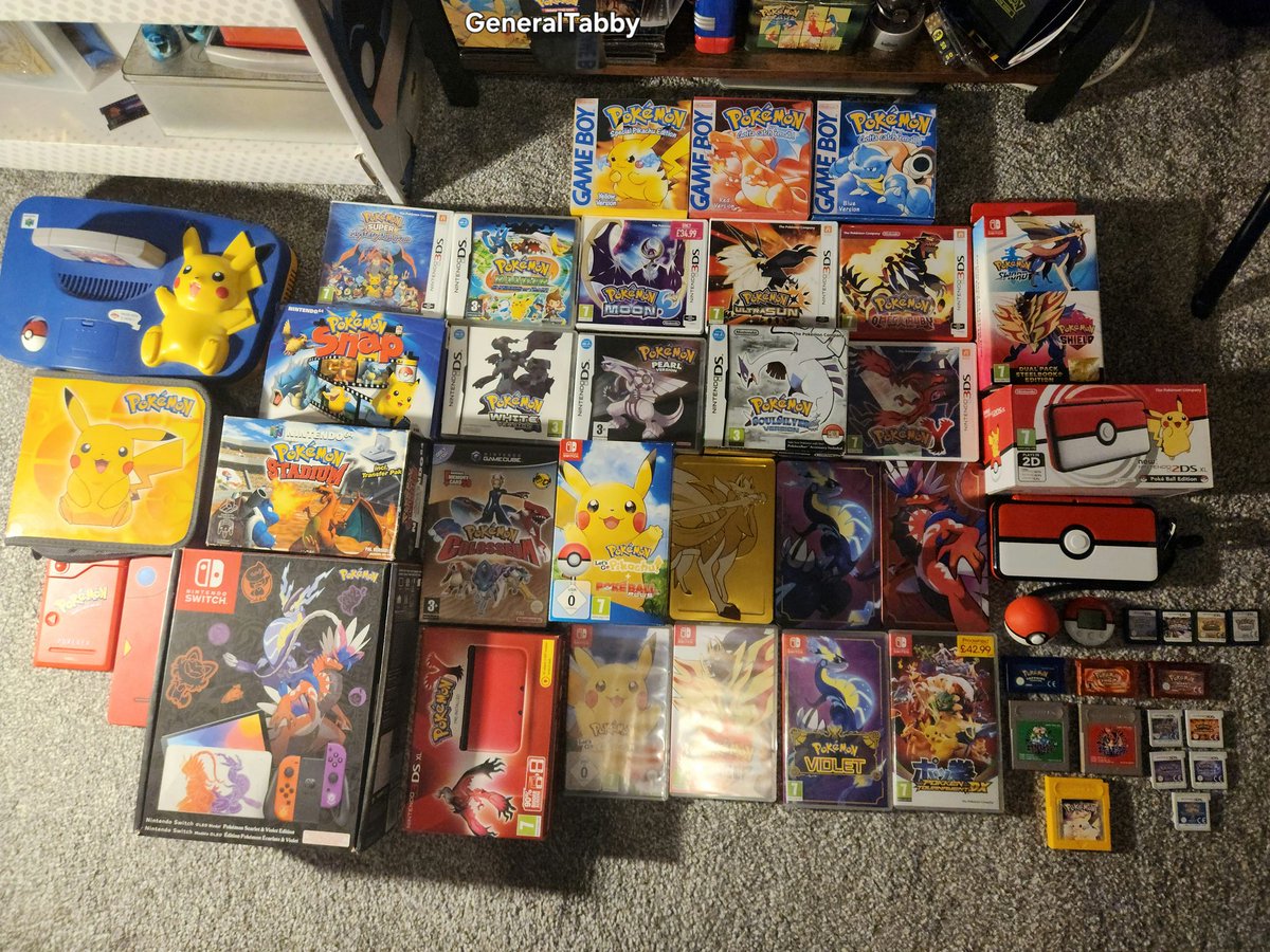GeneralTabby's tweet photo. I have been collecting @Pokemon since it came out in the UK. After decades I have gathered quite a collection! I still collect the games and still have a decent card collection. Here's to many more years of Pokemon! #PokemonDay #Pokemon30 https://t.co/Y4TLhVmZVD