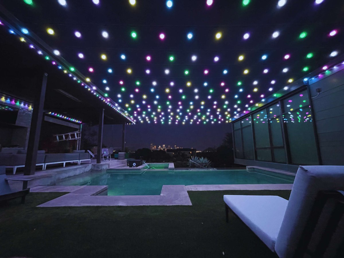 JF_Lighting's tweet photo. The JellyFish Patio Lights have a special ability to amplify any outdoor space. Just check out this most recent installation in Austin! Prepare your outdoor oasis for the upcoming season with color-changing patio lights and get a free quote at the link in bio! https://t.co/wKCmMbSZjE