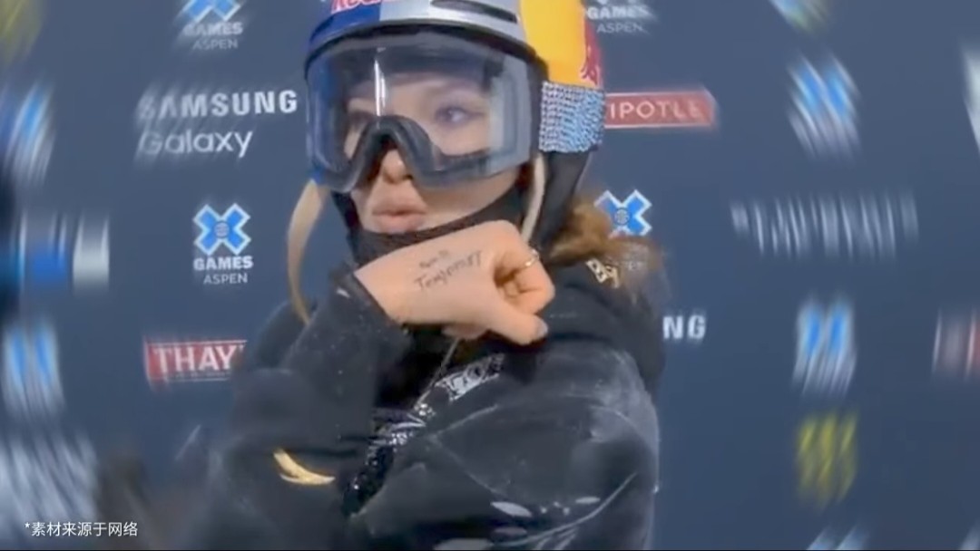 Eileen Gu's tattooed 'pain is temporary' on his hand.