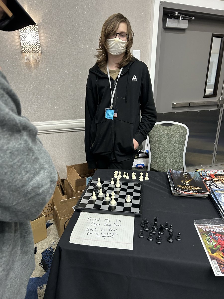 claymcleod's tweet photo. So AuthorCon started off with a bang today and I didn’t take any pictures! But I brought Jasper with me and we set up a chess set for him to challenge convention goers to play him. He’s ready to compete Saturday and Sunday… so face the master blaster! #authorcon #scaresthatcare https://t.co/PmKqn8ZN4A