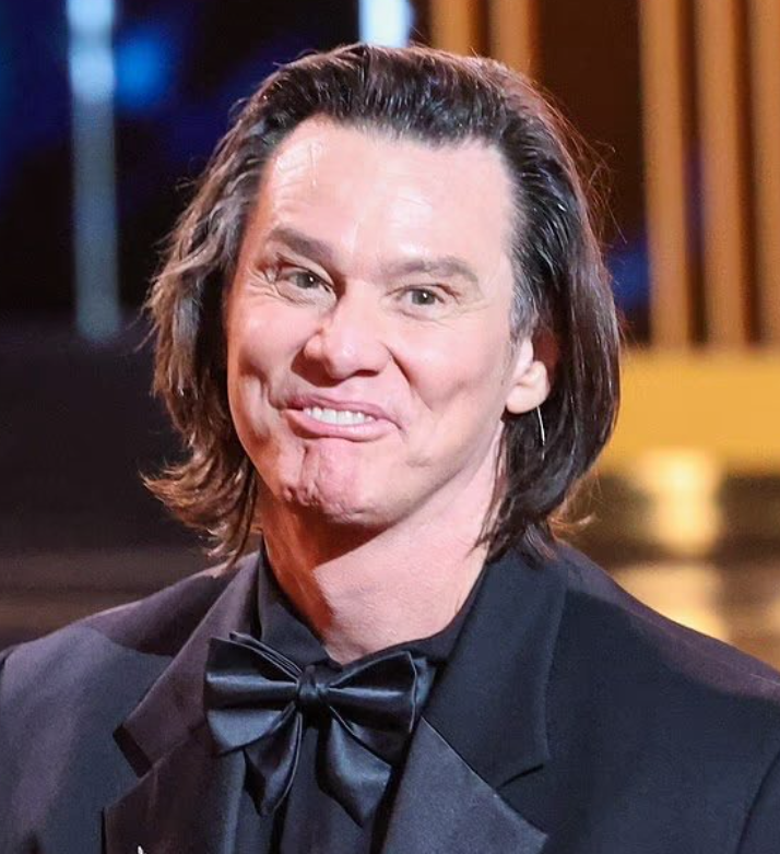 He looks like if Randy Travis had a retarded little brother.