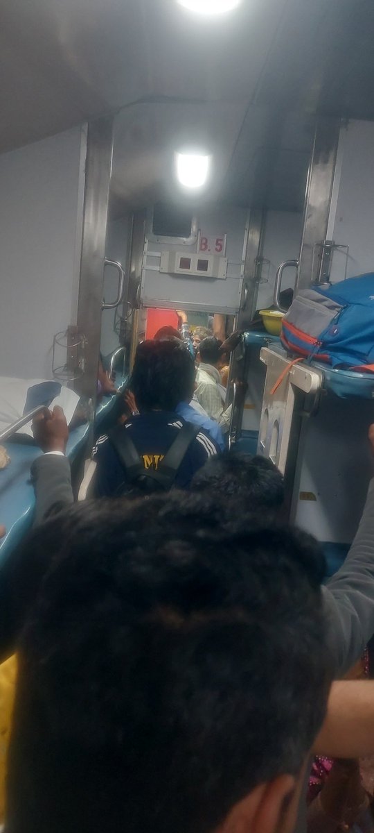 akshatchoudha19's tweet photo. @SrDCMJaipur
 I am traveling in train number 12182 and this is condition of my coach B5 we can't even go to our seats people are overcrowded my seat number is 22 and pnr is 2613312287 
Please help us https://t.co/YcZFm2sXU2