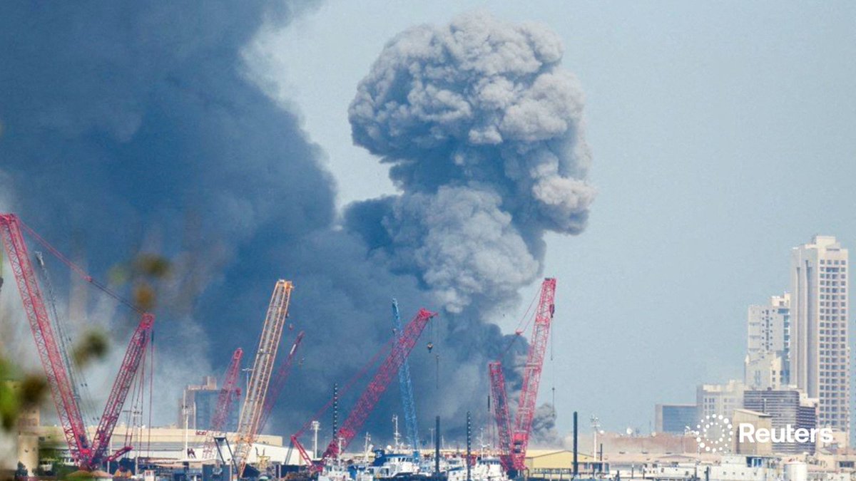 Smoke rises in the sky after blasts were heard in Manama, Bahrain. Iran's foreign minister said Iran's response would be to target all US military bases in the region. Iranian Fars news agency reported US bases in Kuwait, UAE, Qatar and Bahrain are under attack by Iran