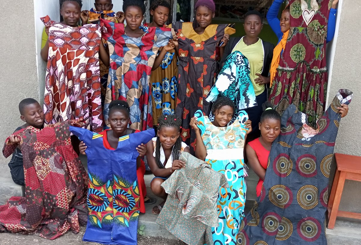 ReliefSeed's tweet photo. Every sewing machine. Dozens of trained hands. Hundreds      of meters of fabric. One purpose — turning vulnerability into vocation      skilling in Bitenge Fashion and design.#Skills4Her #SCOREUganda https://t.co/62YWOKULg3