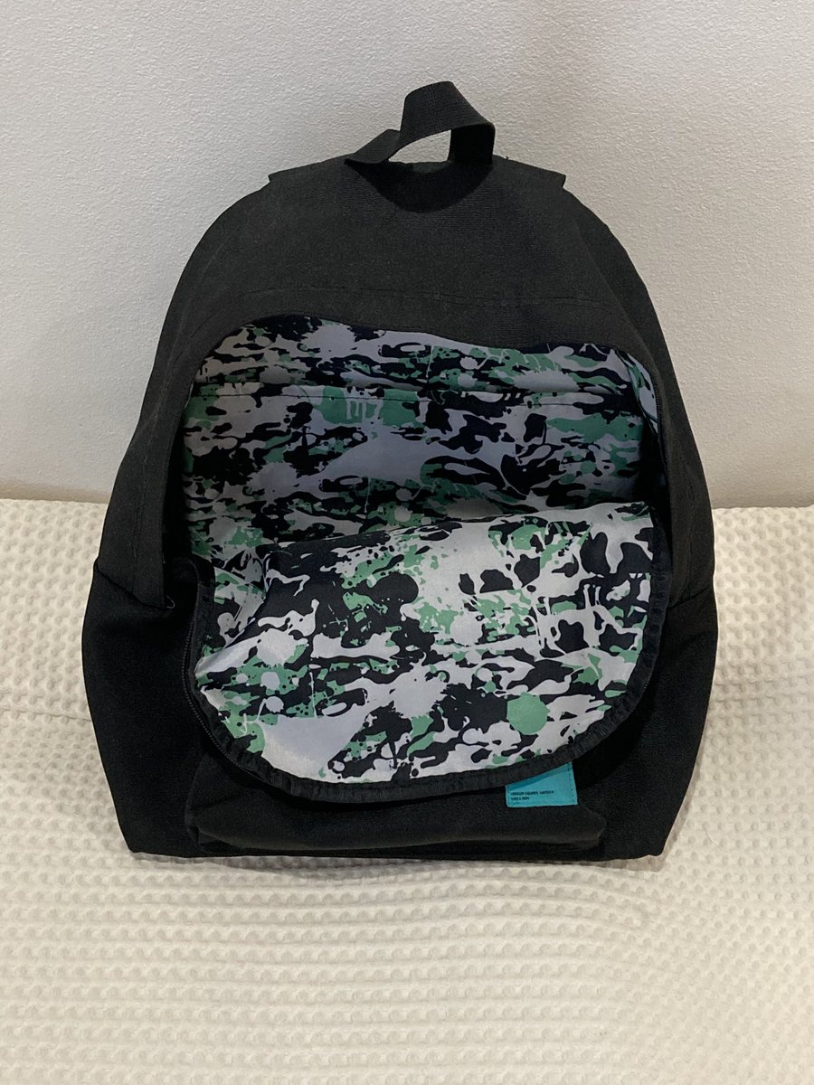 リュック断捨離 UNISON SQUARE GARDEN Dr.Izzy リュック 中まで牛柄で