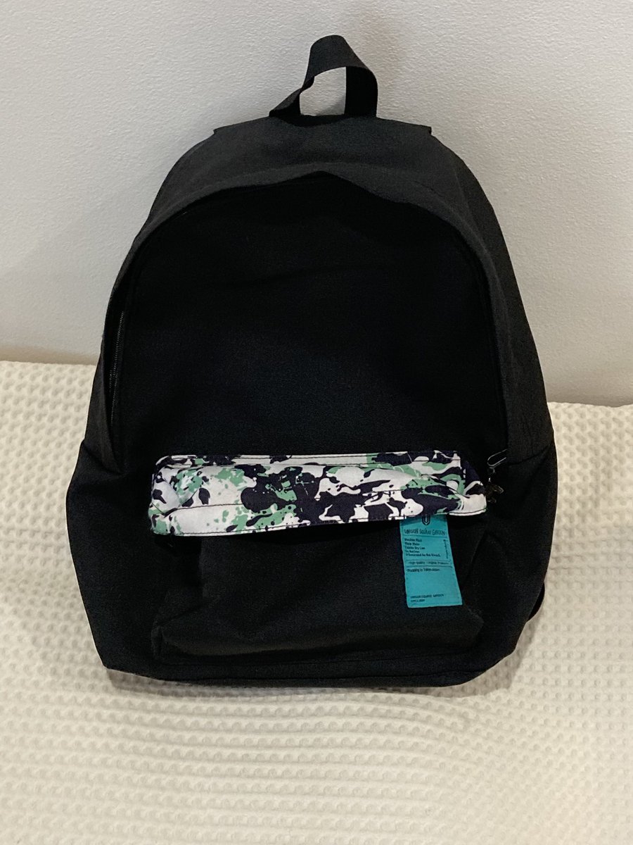 リュック断捨離 UNISON SQUARE GARDEN Dr.Izzy リュック 中まで牛柄で