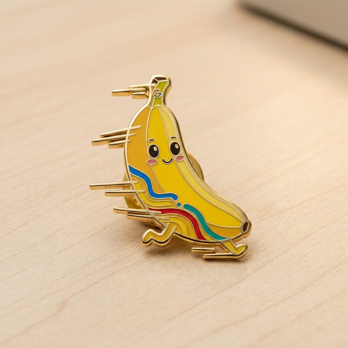 You can use Nano Banana 2 to turn anything into an enamel pin. In <a href="/GeminiApp/">Google Gemini</a> you can select the "Enamel pin" style, or you can use a prompt like this:

Turn just the subject into a gold enamel pin. It's a minimal photo of the pin on a desk, no other items.