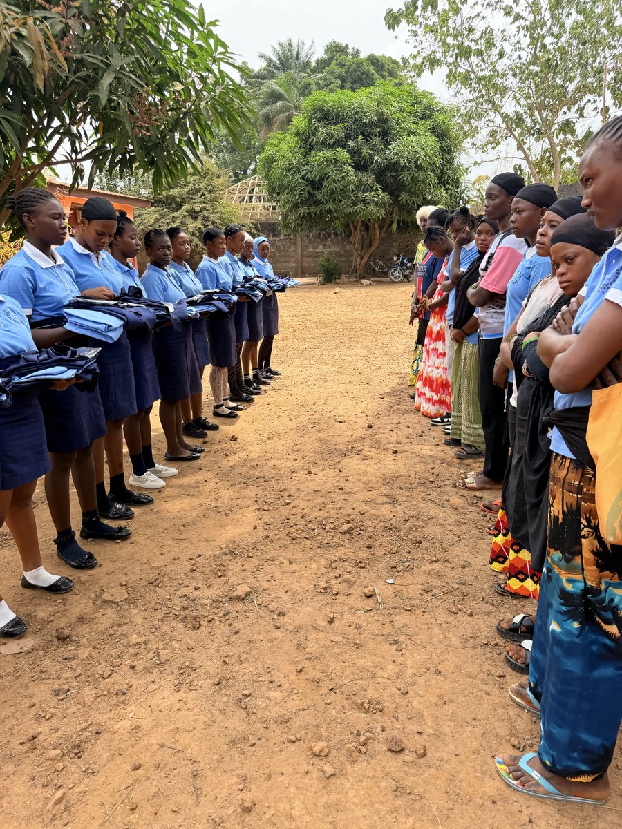 JenebaProject's tweet photo. On Uniform Day at the Sengbe Pieh Academy the older girls hand uniforms to the new cohort. We thank Professor Kate Graney and her “Philosophy and Practices of Peace and Nonviolence Class, Fall 2025” at Skidmore College for their support to provide school materials to the girls. https://t.co/5sp7oZ1u5P