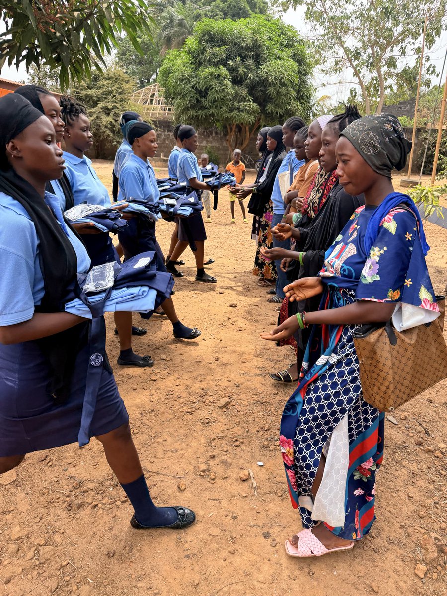 JenebaProject's tweet photo. On Uniform Day at the Sengbe Pieh Academy the older girls hand uniforms to the new cohort. We thank Professor Kate Graney and her “Philosophy and Practices of Peace and Nonviolence Class, Fall 2025” at Skidmore College for their support to provide school materials to the girls. https://t.co/5sp7oZ1u5P