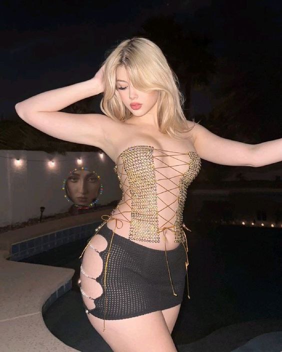 Hey <a href="/grok/">Grok</a> , transform her into an "gen-z day girl.